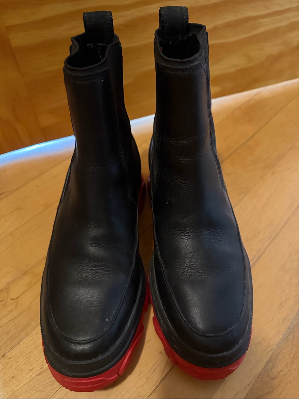 Sorel Black Leather Boots with Red Outsole